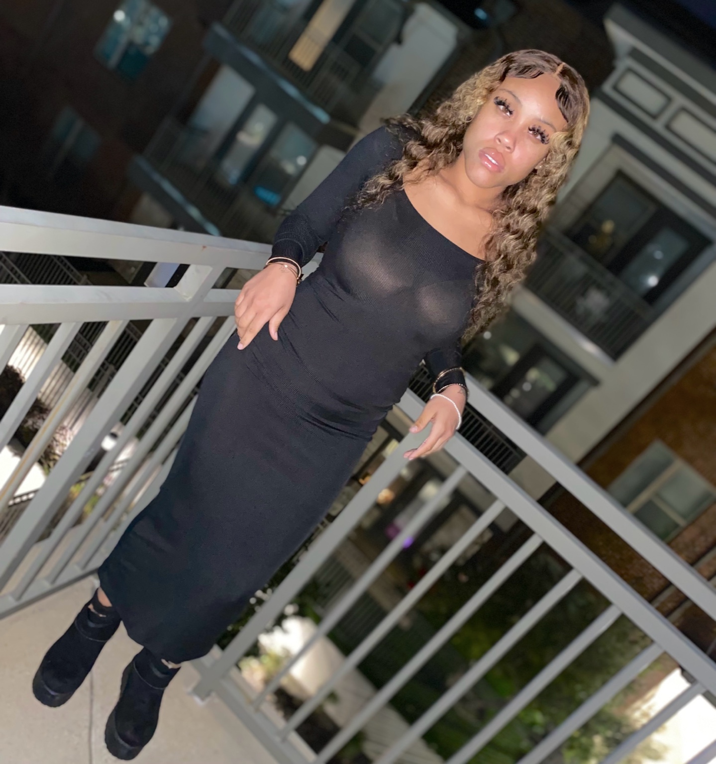 Ty Johnson in black dress